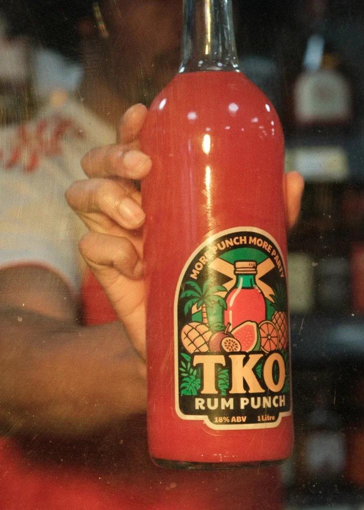 tko-bottle-in-hand-portrait